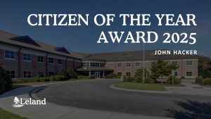 Town Hall image with text overlay reading "Citizen of the Year Award 2025 John Hacker"