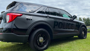 Town of Leland black police vehicle