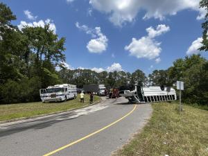 A school bus overturned on the westbound U.S. 74 exit ramp in Leland on Wednesday, July 8, 2026.