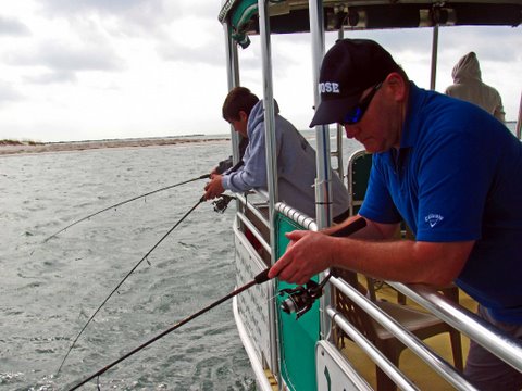 People fishing on a boat