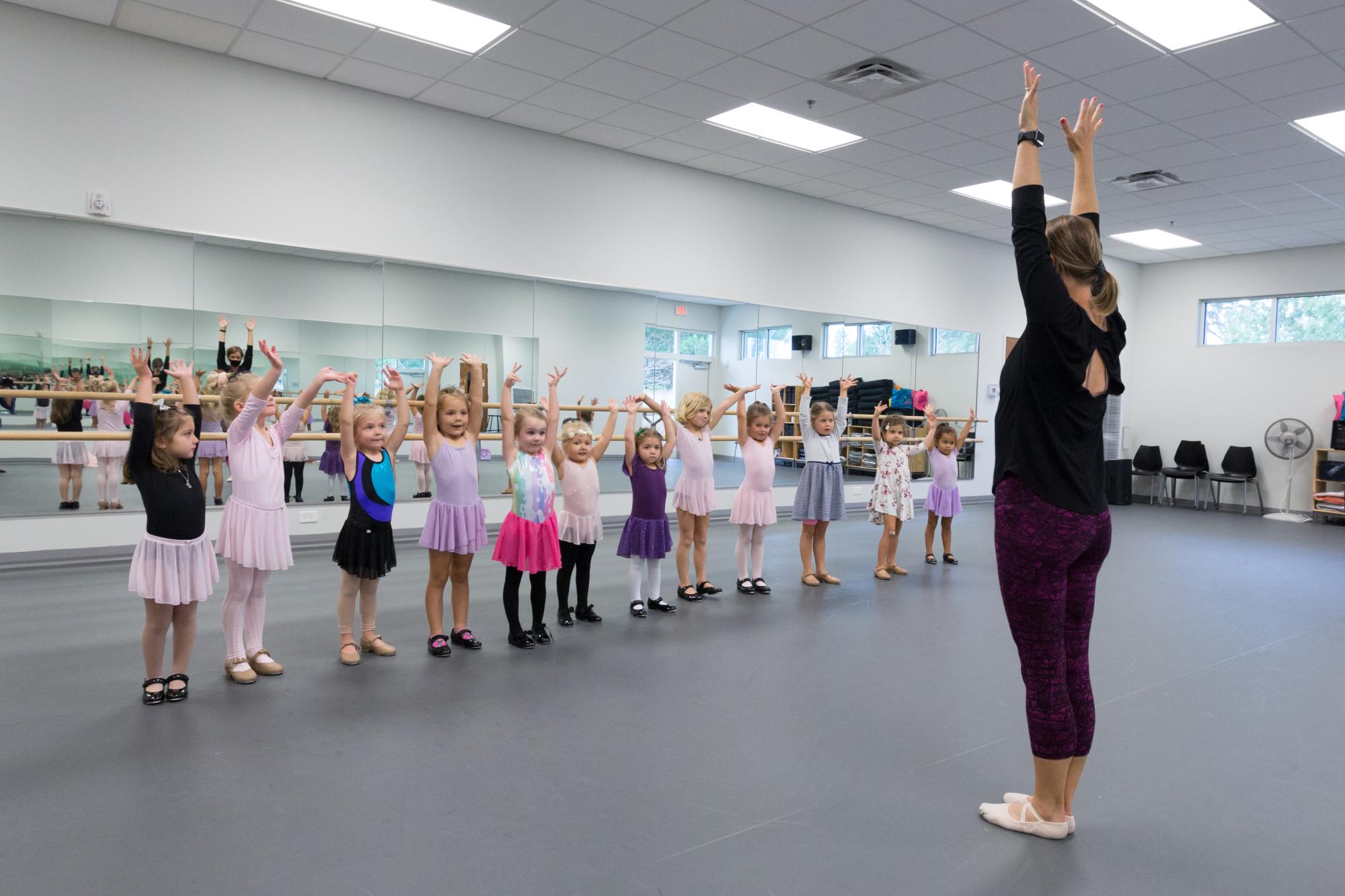 Instructor teaching a youth dance class